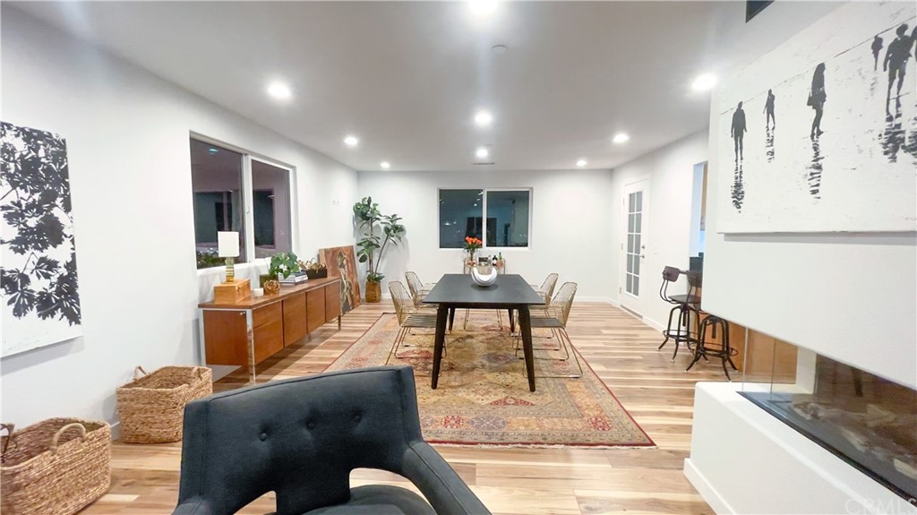 2608 Hines Drive Los Angeles, CA 90065 - Photo 28 of 38 a living room with furniture kitchen view and a wooden floor