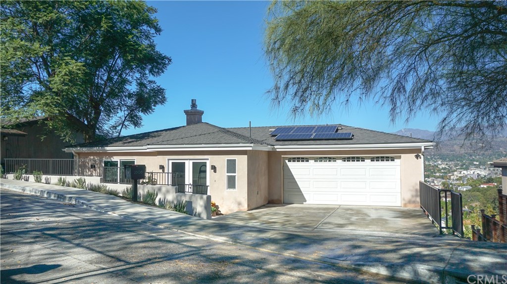2608 Hines Drive Los Angeles, CA 90065 - Photo 3 of 38 a front view of a house with a yard