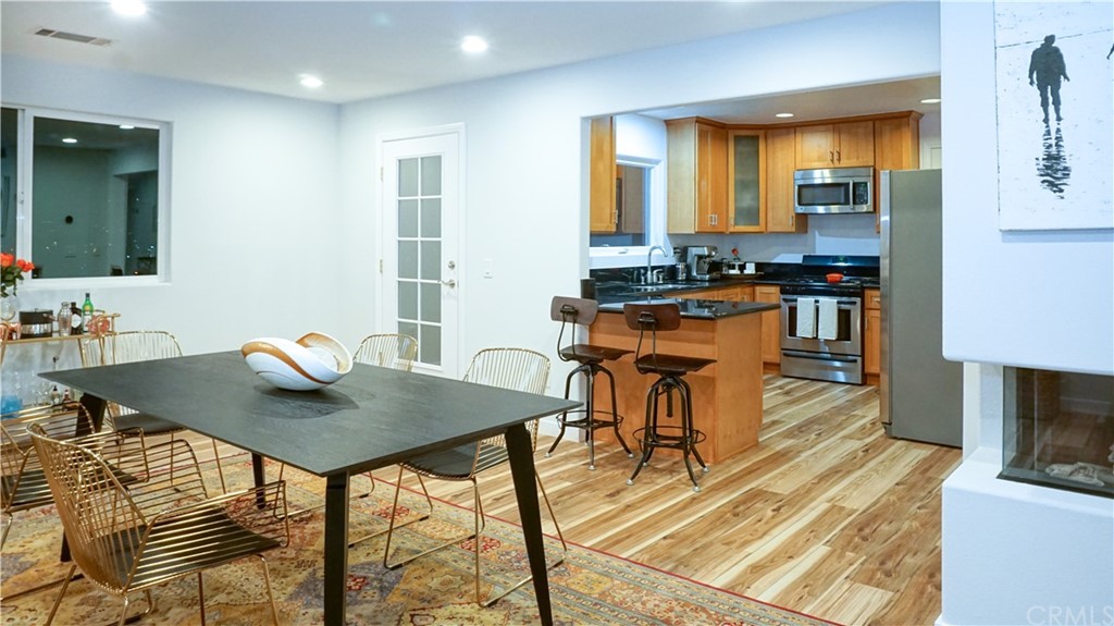 2608 Hines Drive Los Angeles, CA 90065 - Photo 38 of 38 a view of a dining room with furniture and a wooden floor