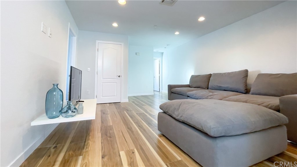 2608 Hines Drive Los Angeles, CA 90065 - Photo 6 of 38 a living room with furniture and a wooden floor
