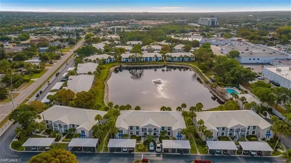 an aerial view of residential houses and outdoor space