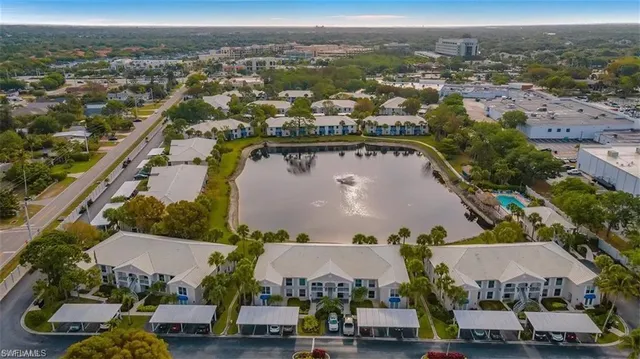 an aerial view of residential houses and outdoor space