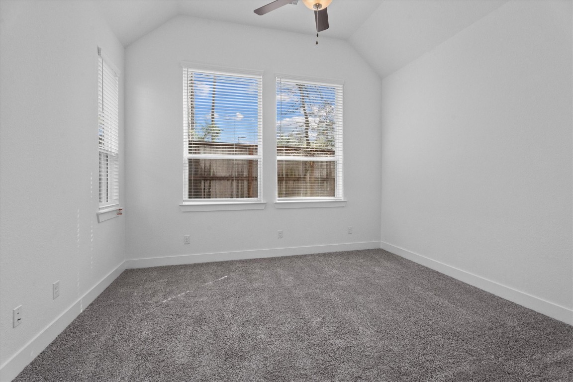 120 Red Cascade Trail Willis, TX 77318 - Photo 20 of 37 an empty room with a window