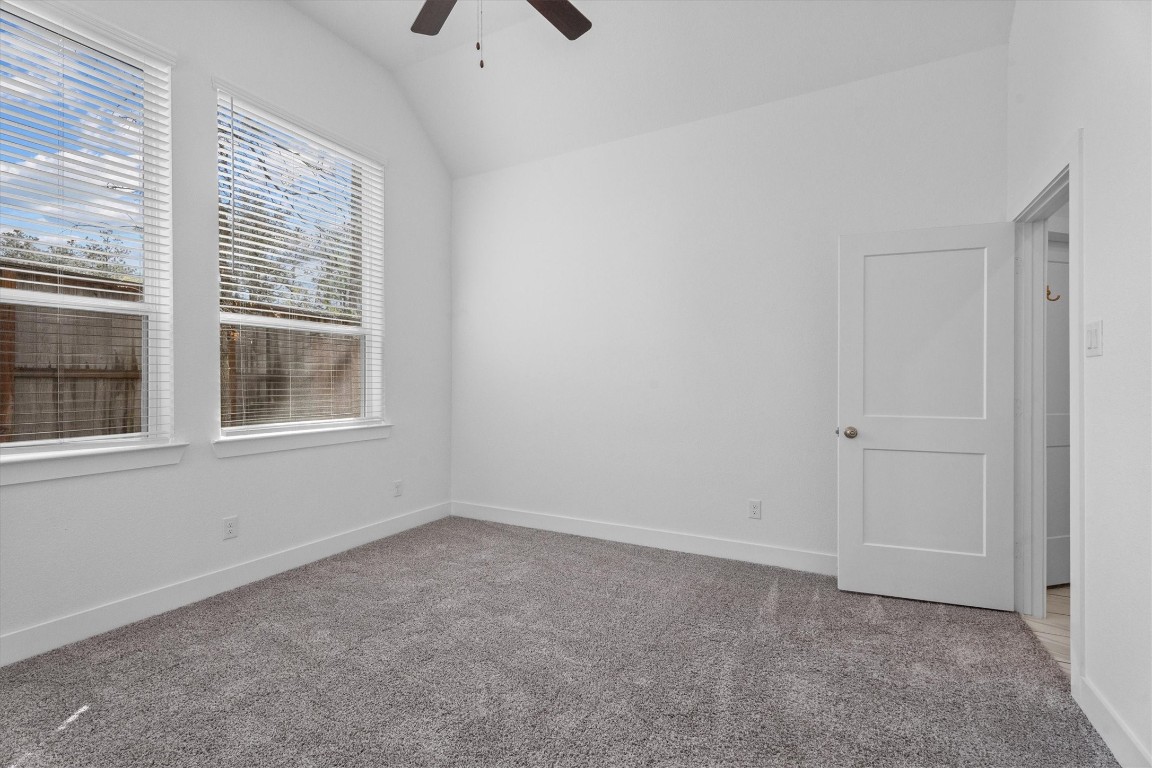 120 Red Cascade Trail Willis, TX 77318 - Photo 21 of 37 a view of an empty room with a window