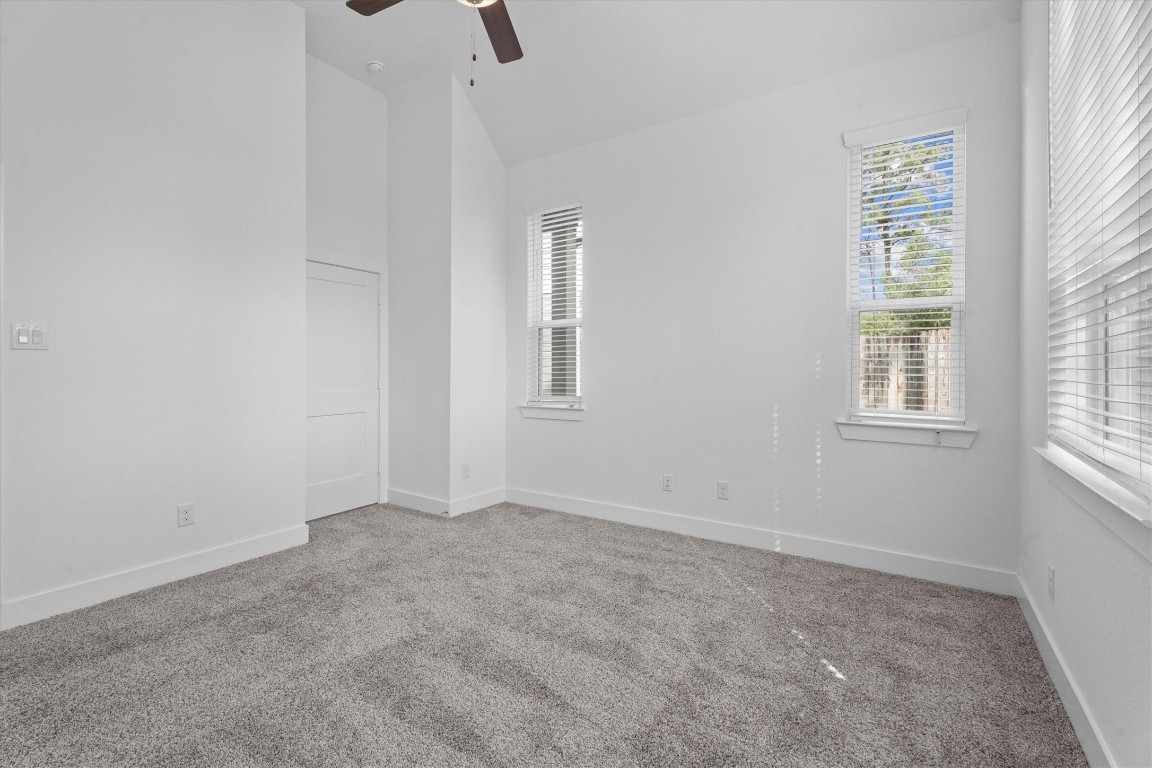 120 Red Cascade Trail Willis, TX 77318 - Photo 23 of 37 an empty room with windows