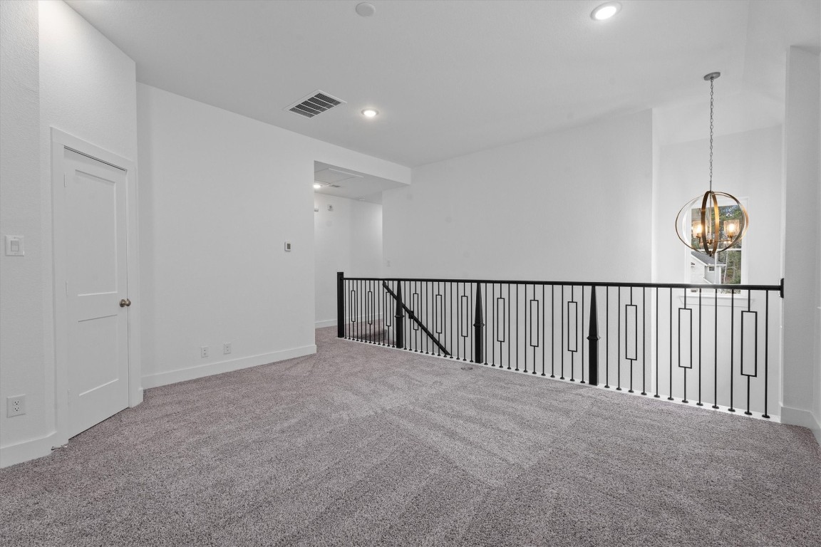 120 Red Cascade Trail Willis, TX 77318 - Photo 29 of 37 a view of staircase with rug floor