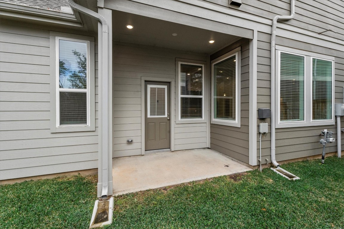120 Red Cascade Trail Willis, TX 77318 - Photo 34 of 37 a view of house with small yard