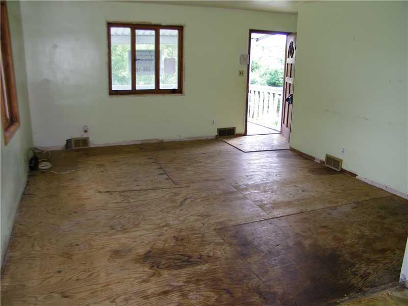 562 Shaffer Road Hookstown, PA 15050 - Photo 2 of 21 Living Room. The living room is accessed from the covered front porch