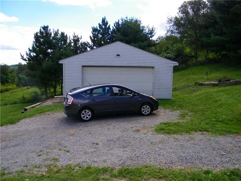 562 Shaffer Road Hookstown, PA 15050 - Photo 14 of 21 Parking Lot/Garage. A two car detached garage is situated to the side of the home. There is an additional 1 car integral garage
