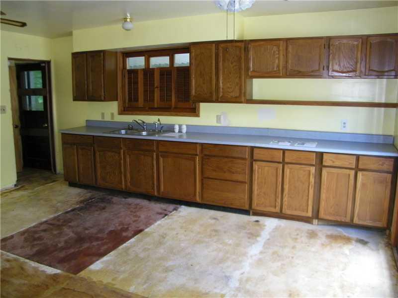 562 Shaffer Road Hookstown, PA 15050 - Photo 5 of 21 Kitchen. Oak cabinetry is accented by the country blue counter tops. A double stainless steel sink will make meal preparation easy