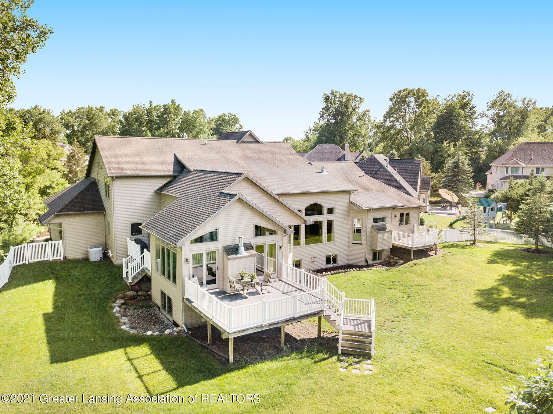 910 Abbey Road East Lansing, MI 48823 - Photo 4 of 57 back elevation