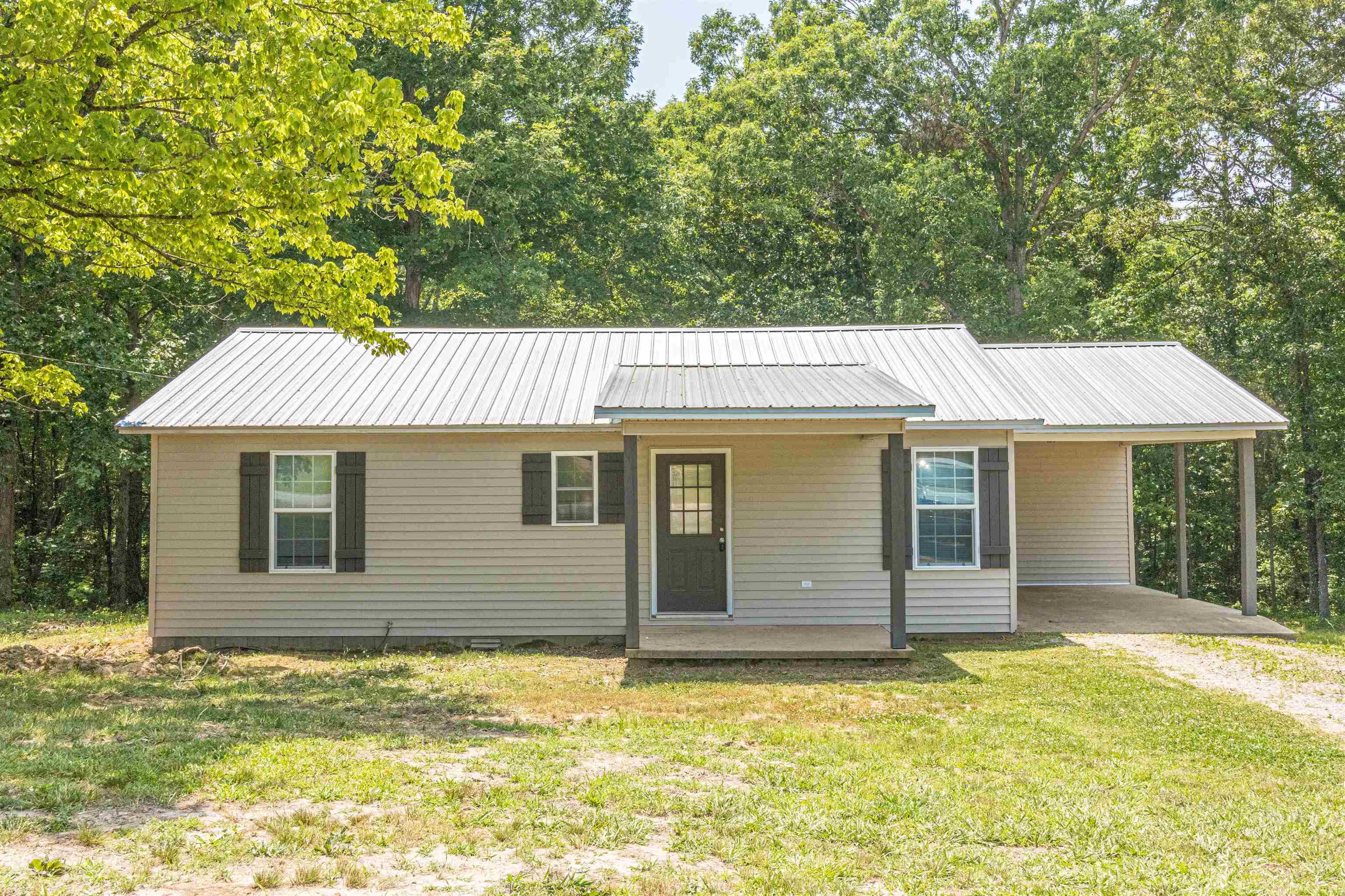 3532 Ramer Selmer Road Ramer, TN 38367 - Photo 1 of 15 a backyard of a house