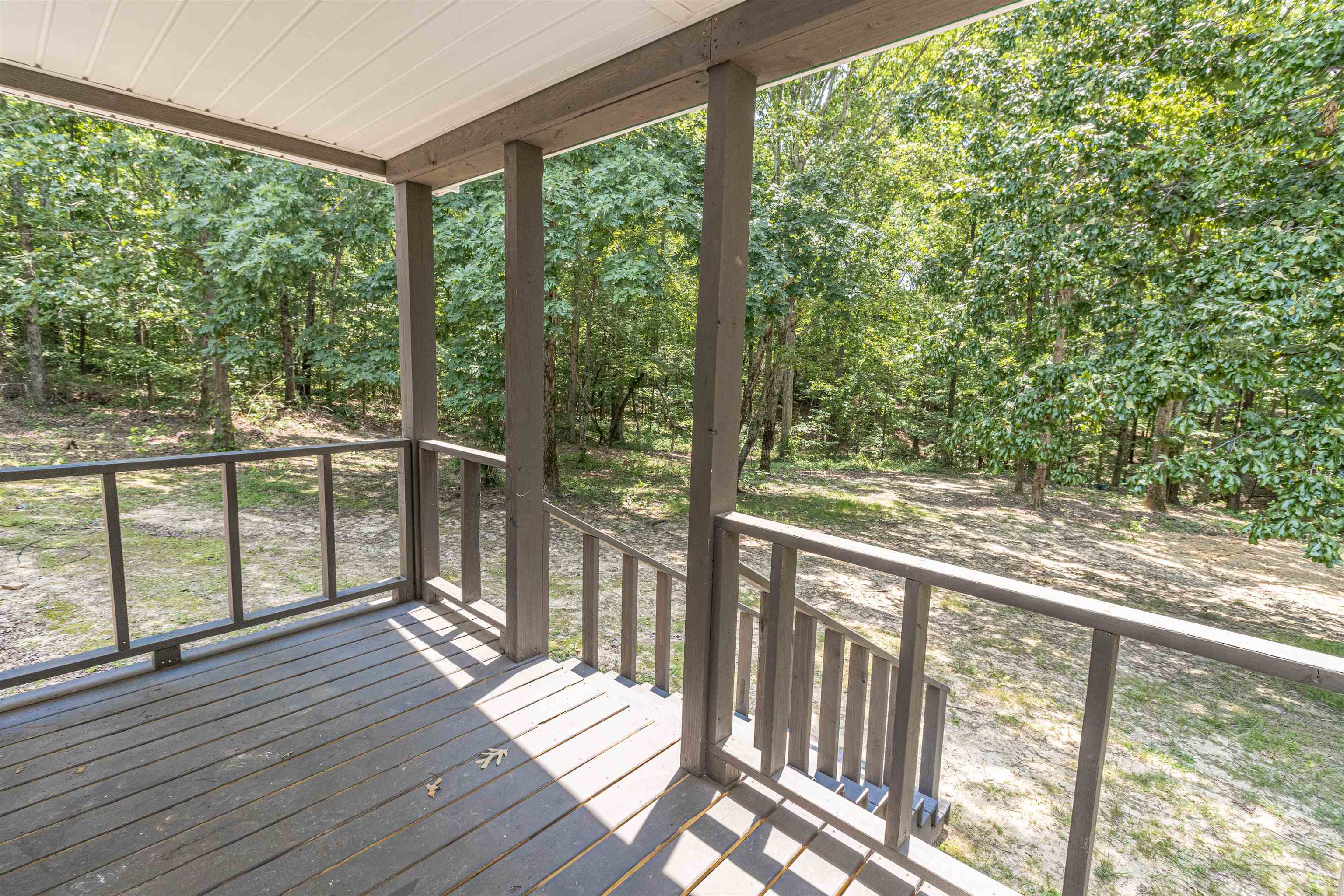 3532 Ramer Selmer Road Ramer, TN 38367 - Photo 3 of 15 a view of a deck with wooden floor and wooden fence