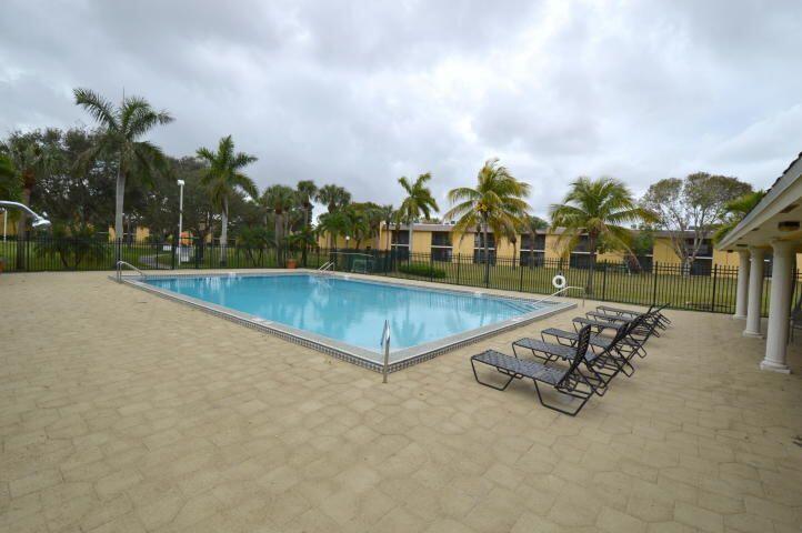 709 Meadows Circle Boynton Beach, FL 33436 - Photo 18 of 24 pool