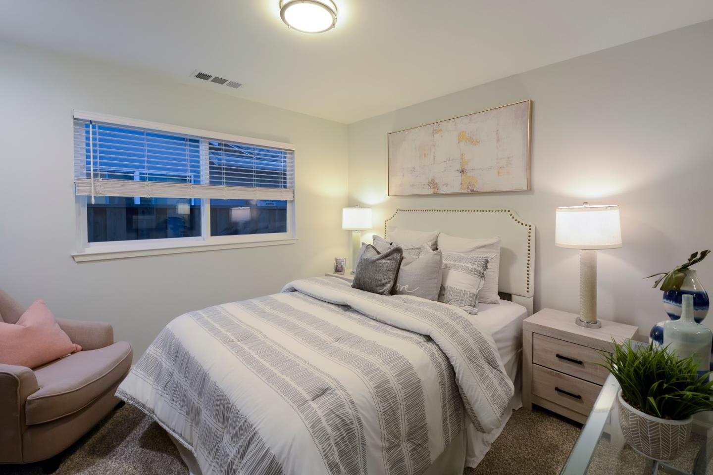 10166 Bonny Drive Cupertino, CA 95014 - Photo 21 of 46 a bedroom with a bed and a couch