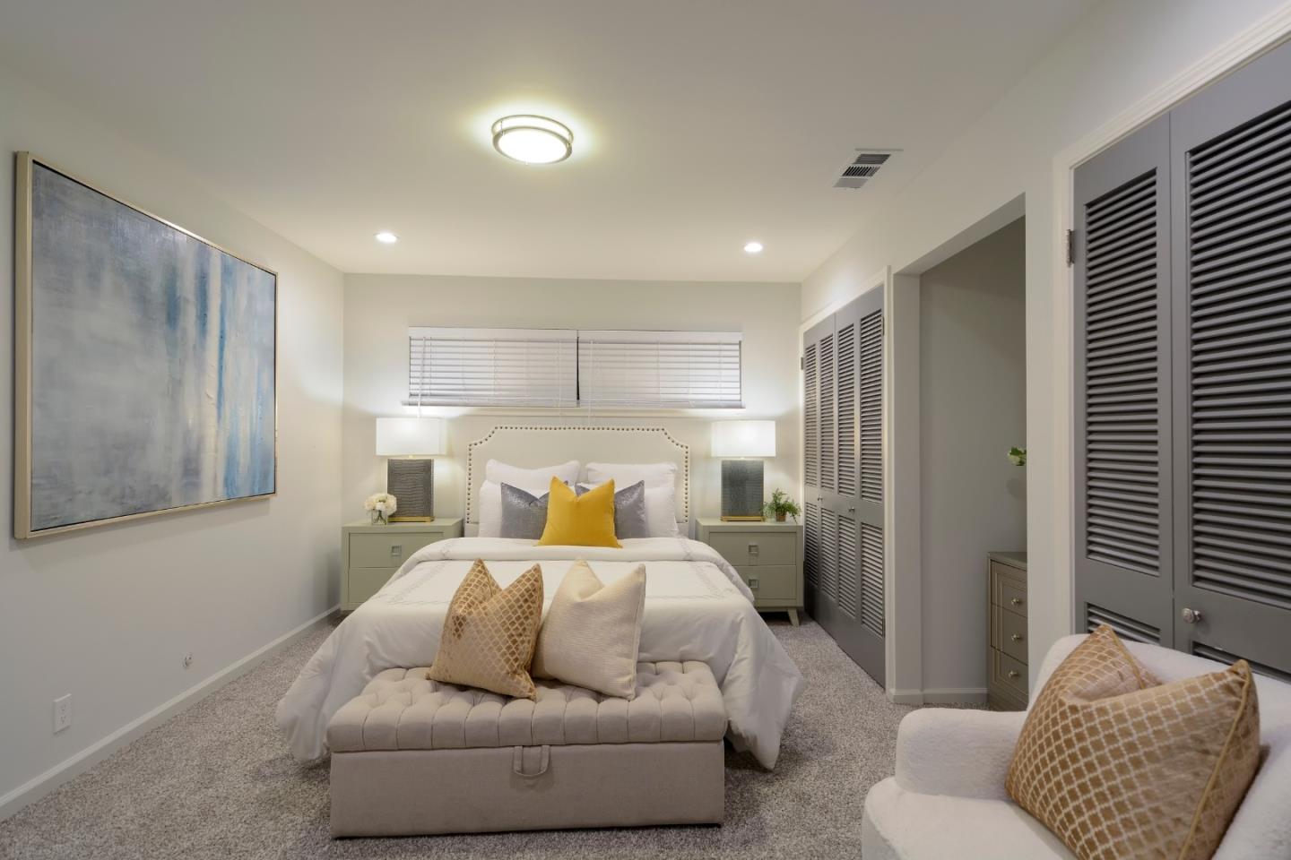 10166 Bonny Drive Cupertino, CA 95014 - Photo 27 of 46 a bedroom with a bed and a couch