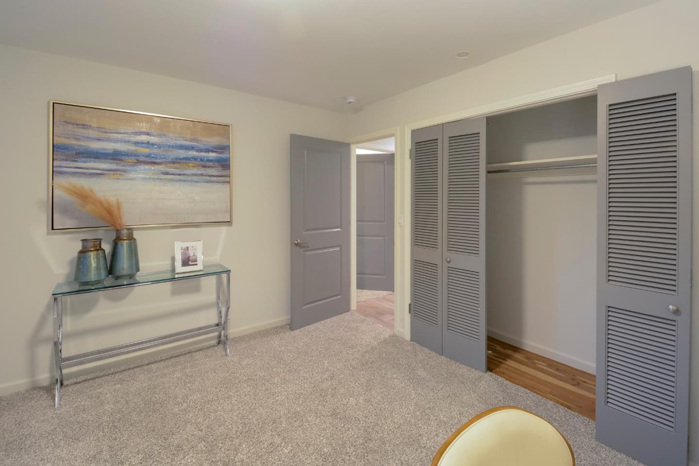 10166 Bonny Drive Cupertino, CA 95014 - Photo 37 of 46 a view of room with closet and cabinet