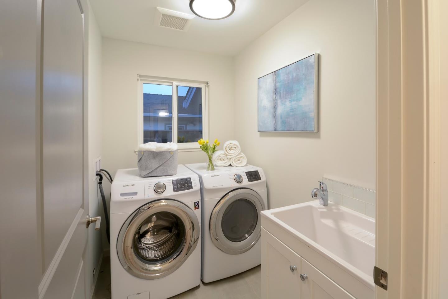 10166 Bonny Drive Cupertino, CA 95014 - Photo 38 of 46 a utility room with dryer and washer
