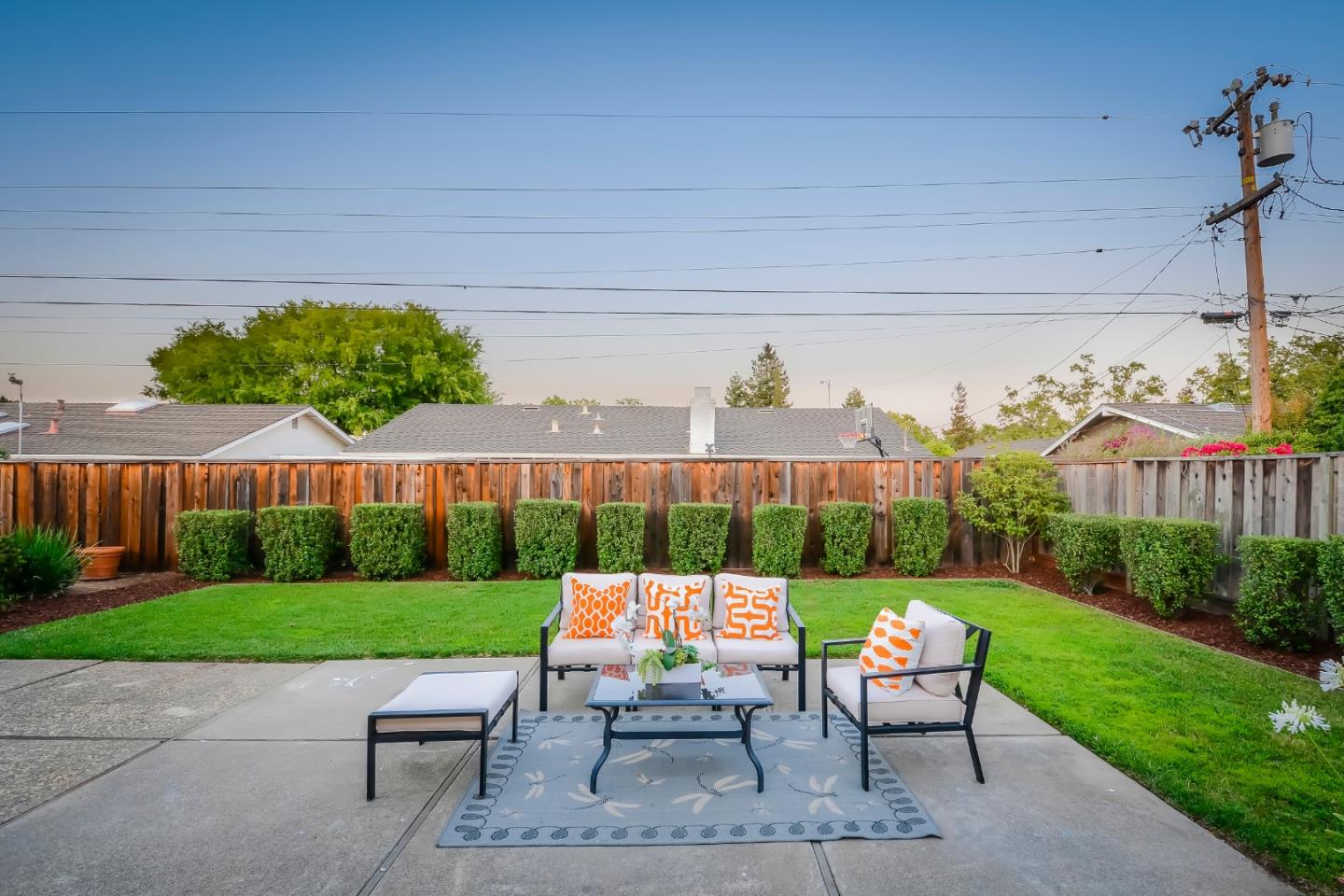 10166 Bonny Drive Cupertino, CA 95014 - Photo 42 of 46 a backyard of a house with outdoor seating