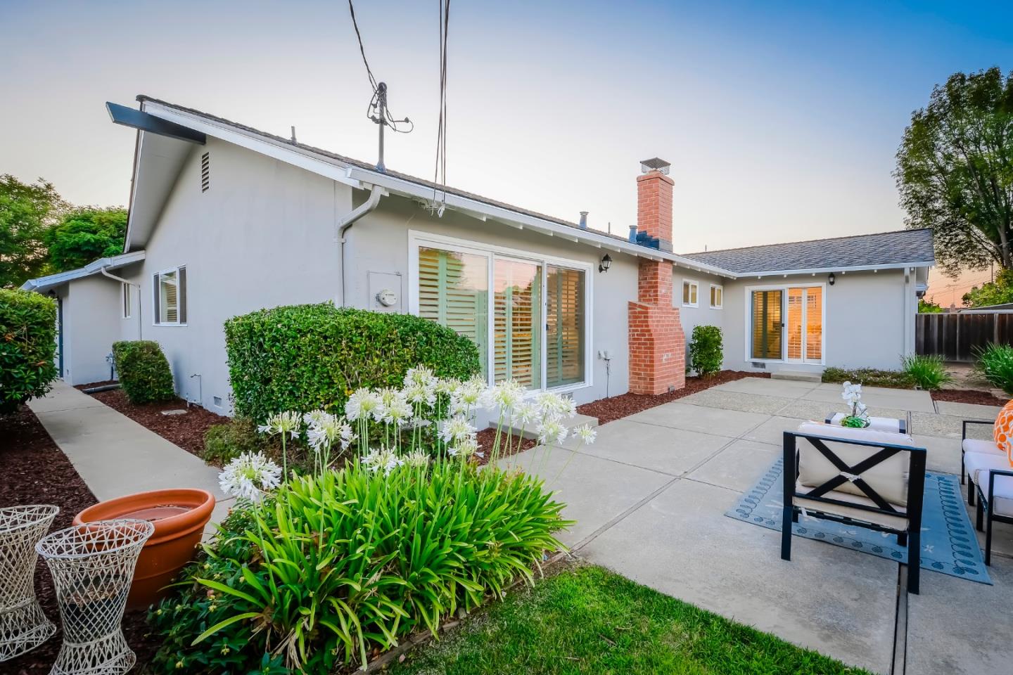 10166 Bonny Drive Cupertino, CA 95014 - Photo 43 of 46 a view of a house with backyard and sitting area