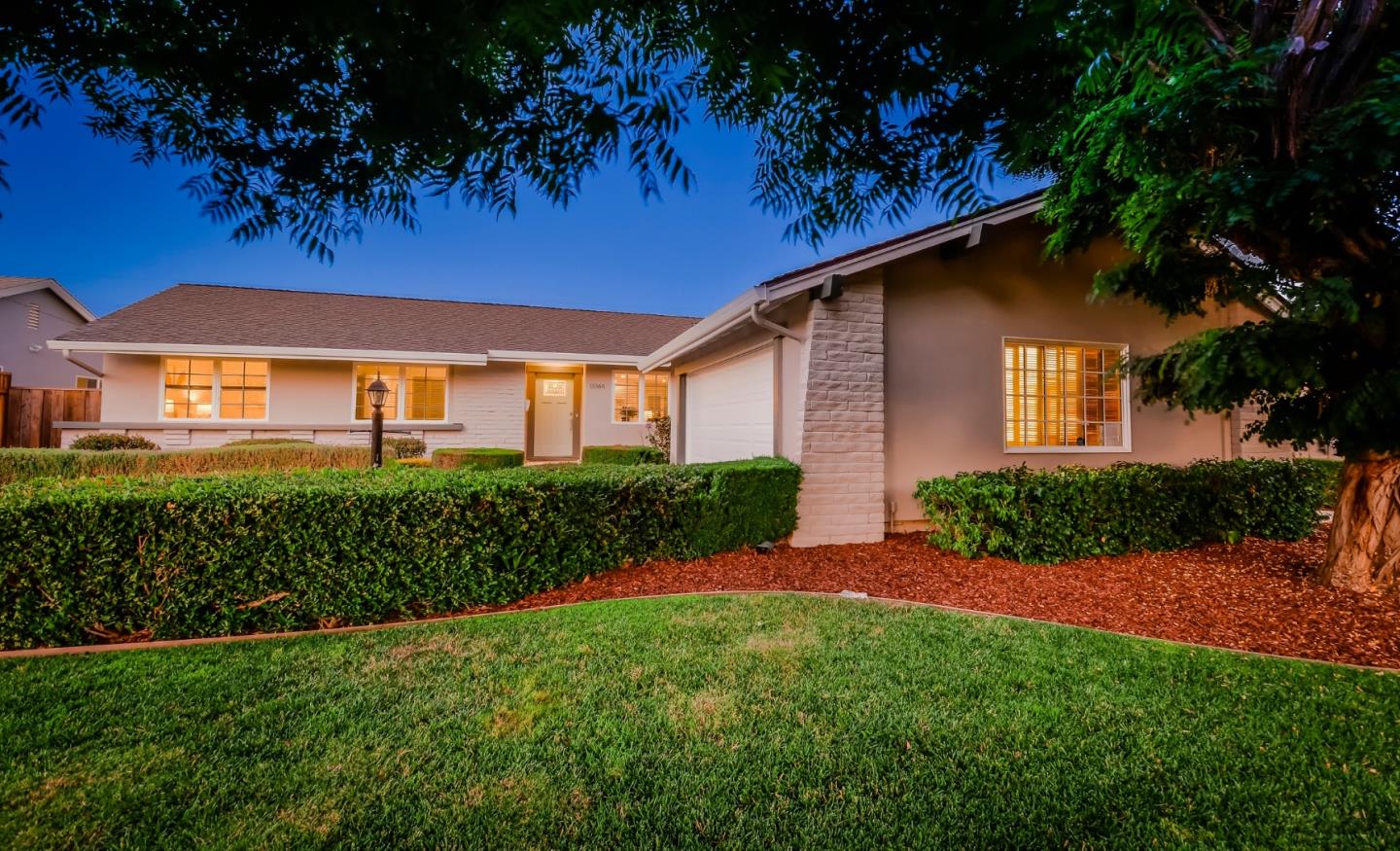 10166 Bonny Drive Cupertino, CA 95014 - Photo 44 of 46 a front view of a house with a garden