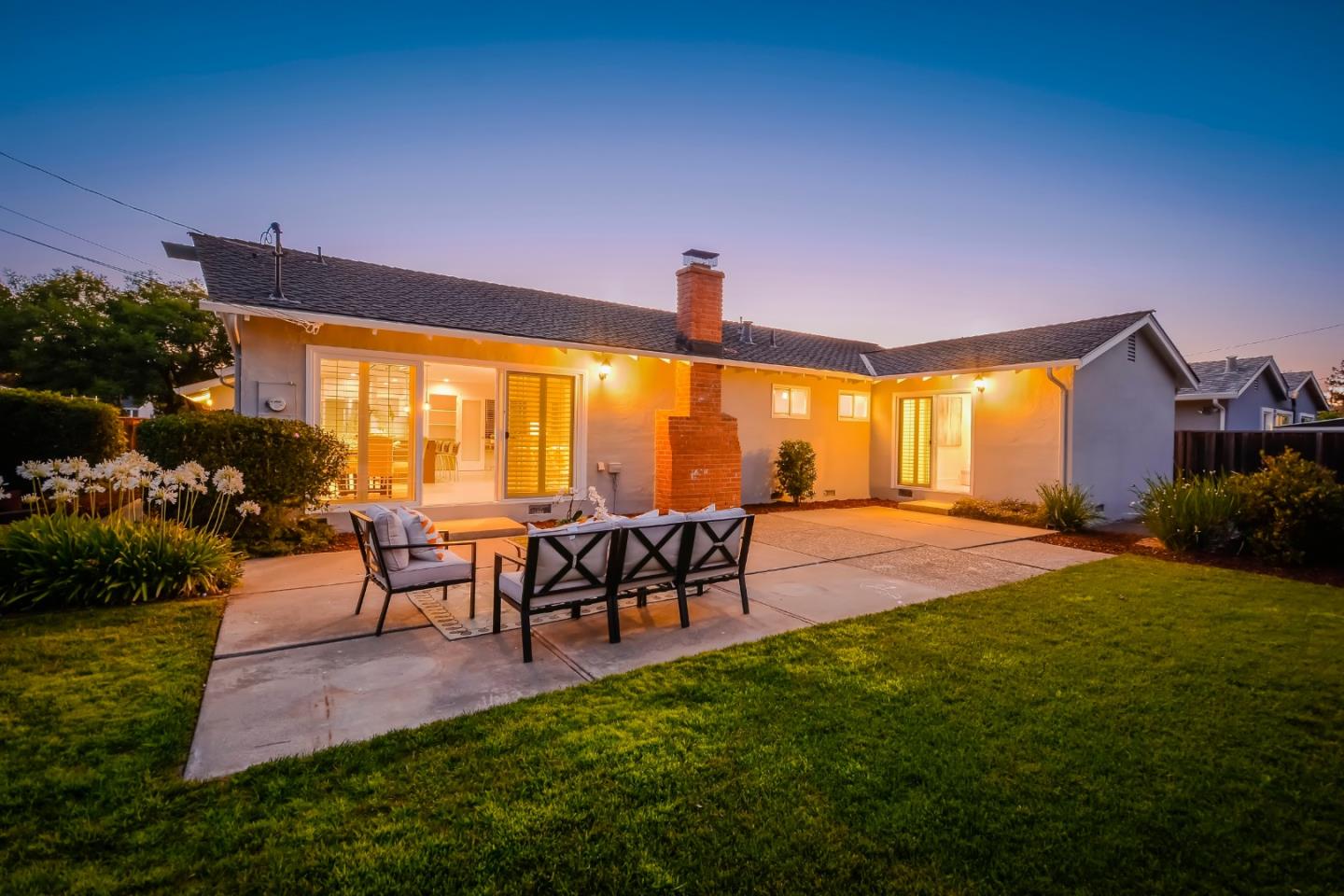 10166 Bonny Drive Cupertino, CA 95014 - Photo 45 of 46 a view of a swimming pool and lounge chairs