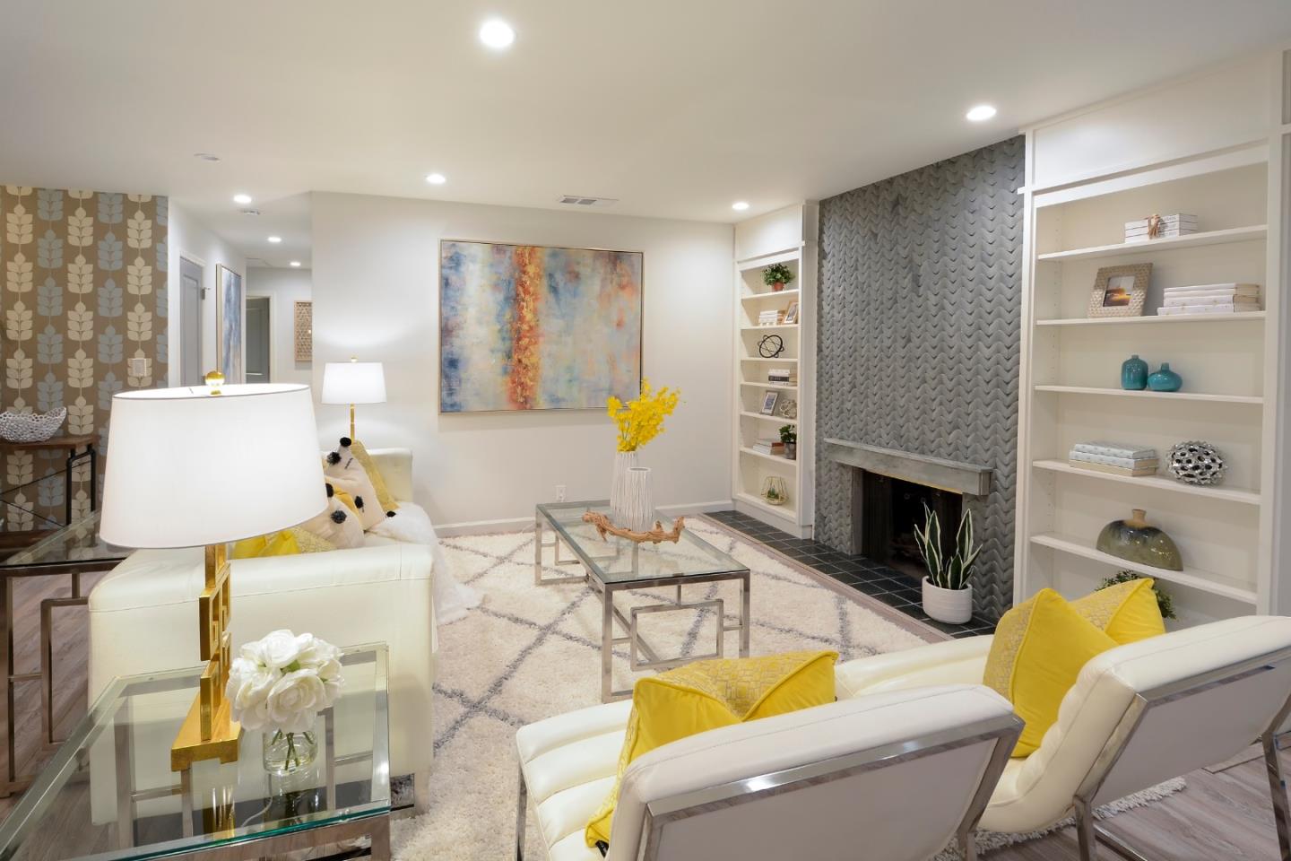 10166 Bonny Drive Cupertino, CA 95014 - Photo 5 of 46 a living room with furniture a fireplace and a flat screen tv