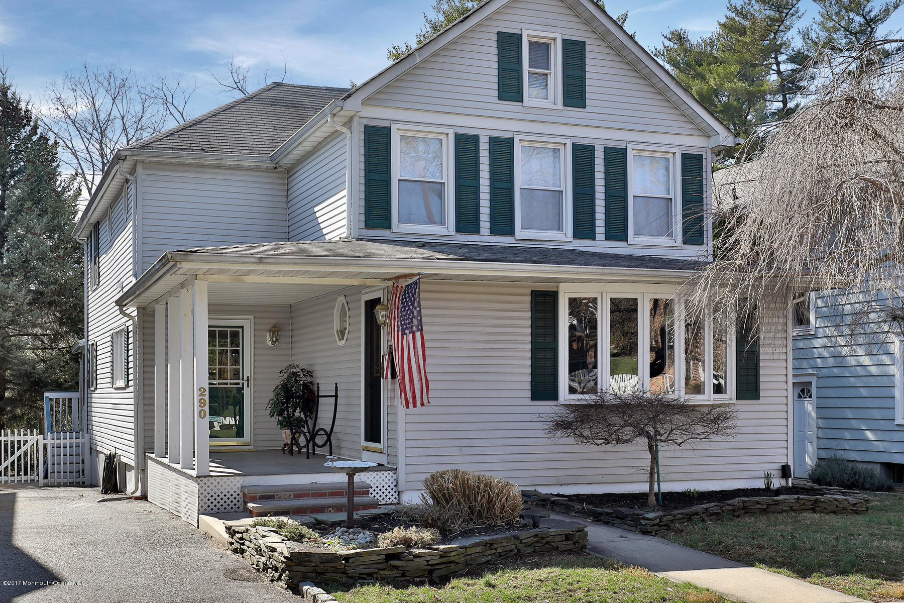 290 Spring Street Red Bank, NJ 07701 - Photo 1 of 26 a front view of a house with garden