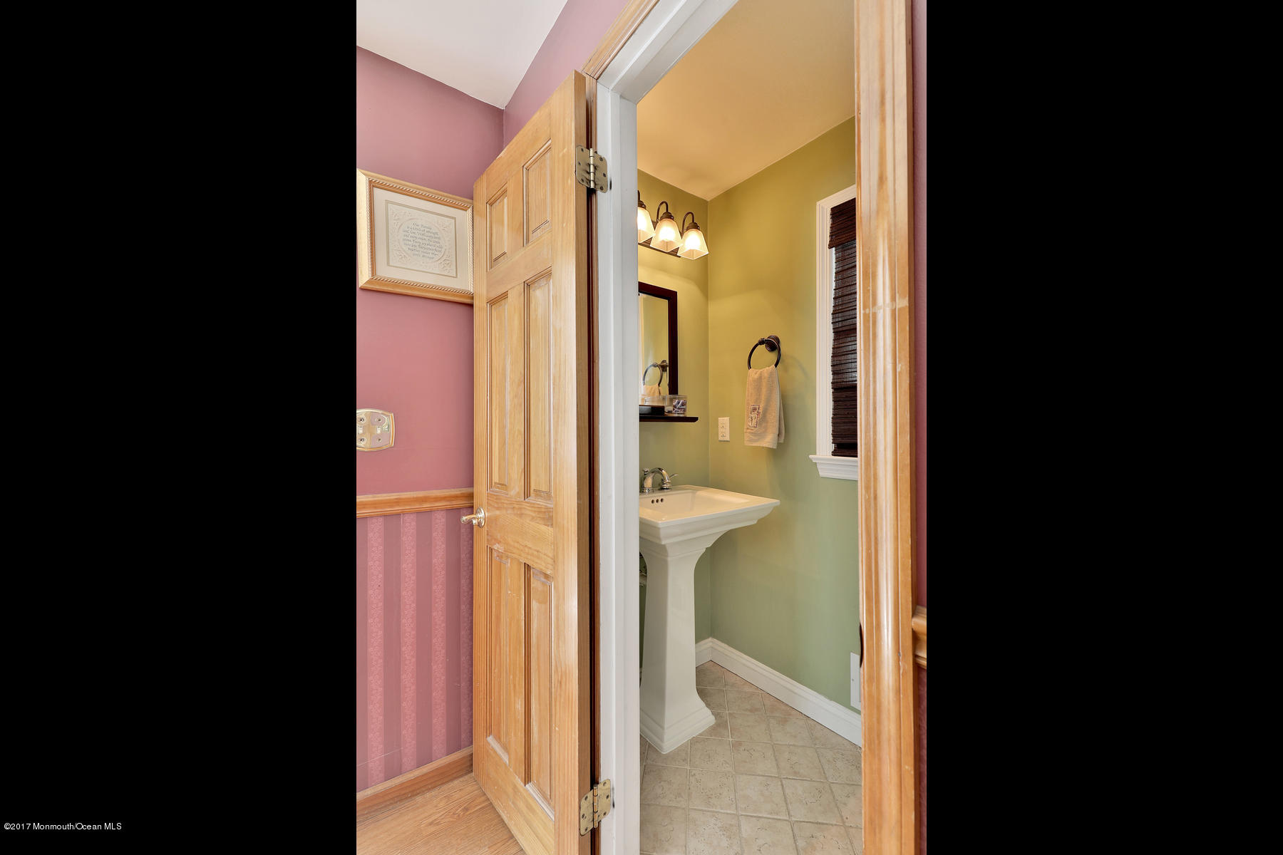 290 Spring Street Red Bank, NJ 07701 - Photo 14 of 26 a view of a bathroom from a corridor