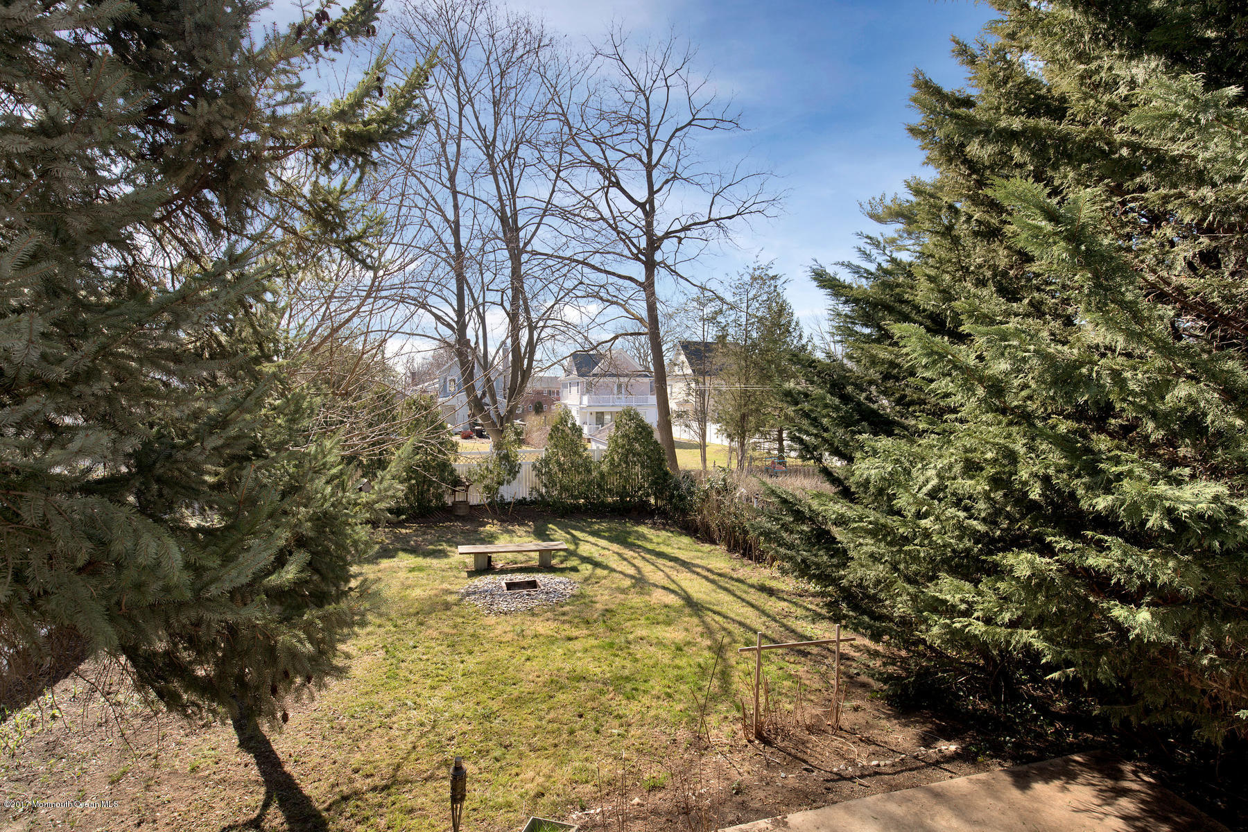 290 Spring Street Red Bank, NJ 07701 - Photo 23 of 26 a view of a yard with trees