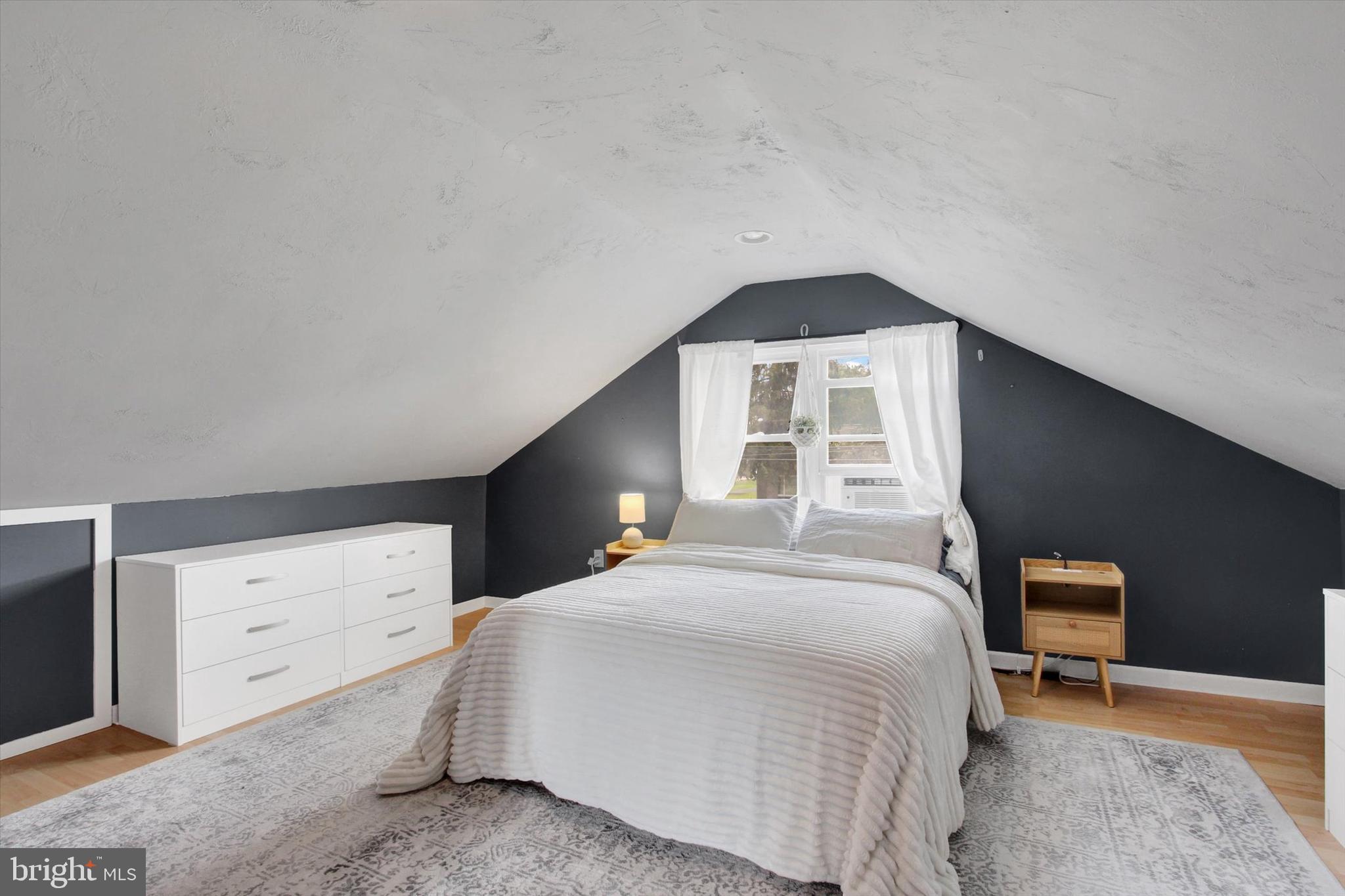 516 North Scott Street York, PA 17404 - Photo 11 of 22 a bedroom with a bed and a dresser