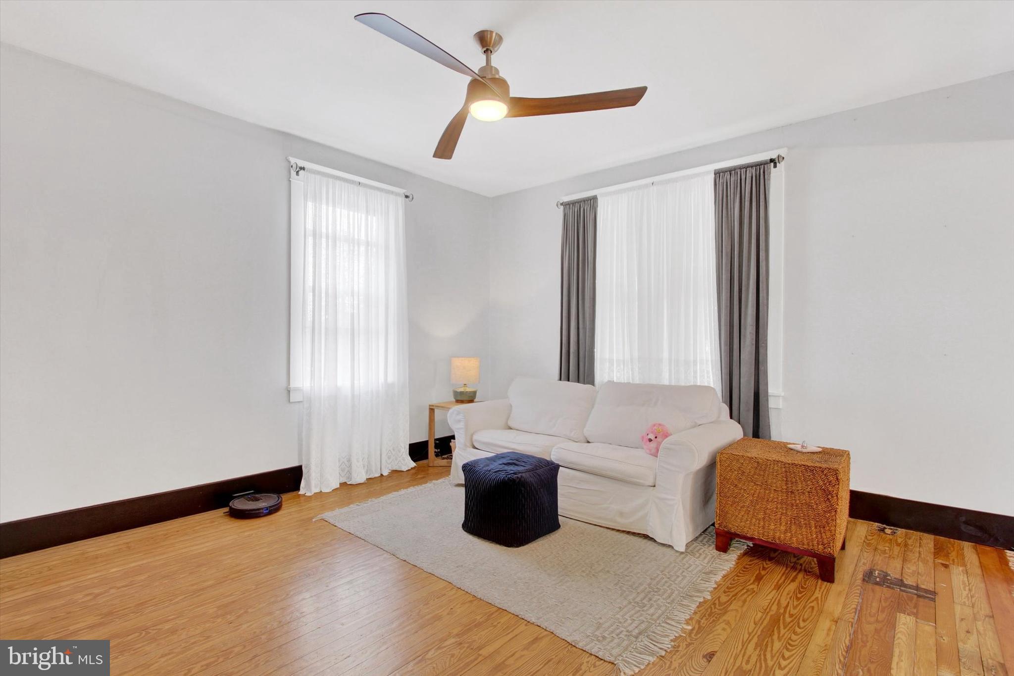 516 North Scott Street York, PA 17404 - Photo 3 of 22 a bedroom with furniture and a window