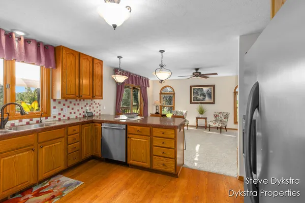 $615,000 | 2264 Grand Valley Drive Northeast, Ada, MI 49301