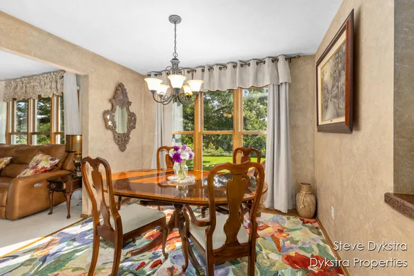 $615,000 | 2264 Grand Valley Drive Northeast, Ada, MI 49301