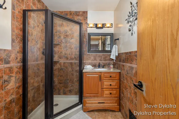 $615,000 | 2264 Grand Valley Drive Northeast, Ada, MI 49301