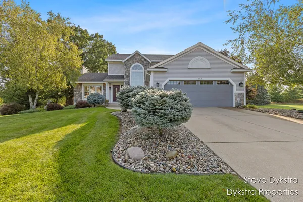 $615,000 | 2264 Grand Valley Drive Northeast, Ada, MI 49301
