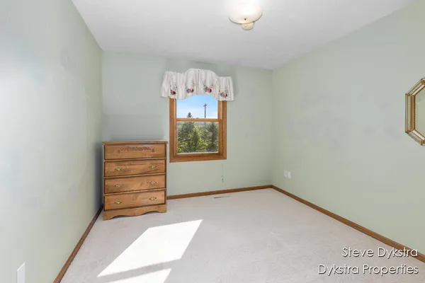 $615,000 | 2264 Grand Valley Drive Northeast, Ada, MI 49301