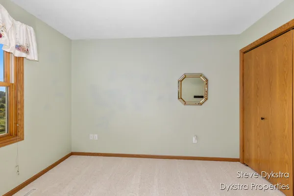 $615,000 | 2264 Grand Valley Drive Northeast, Ada, MI 49301