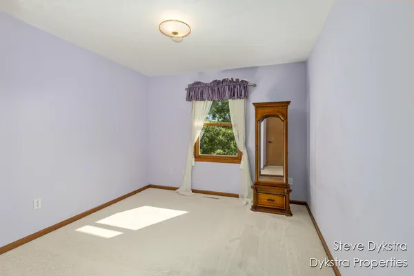 $615,000 | 2264 Grand Valley Drive Northeast, Ada, MI 49301