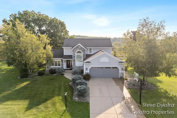 $615,000 | 2264 Grand Valley Drive Northeast, Ada, MI 49301