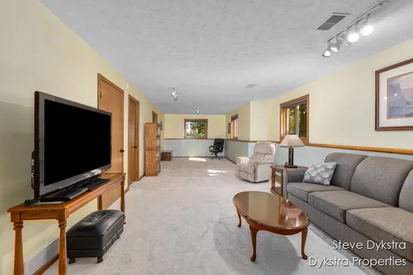 $615,000 | 2264 Grand Valley Drive Northeast, Ada, MI 49301