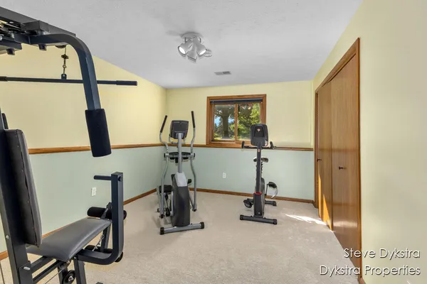 $615,000 | 2264 Grand Valley Drive Northeast, Ada, MI 49301