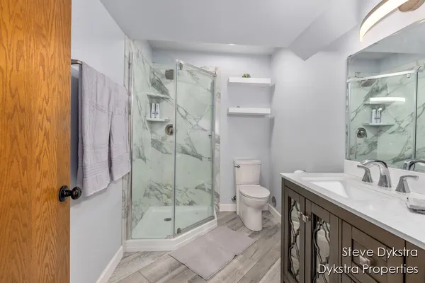 $615,000 | 2264 Grand Valley Drive Northeast, Ada, MI 49301