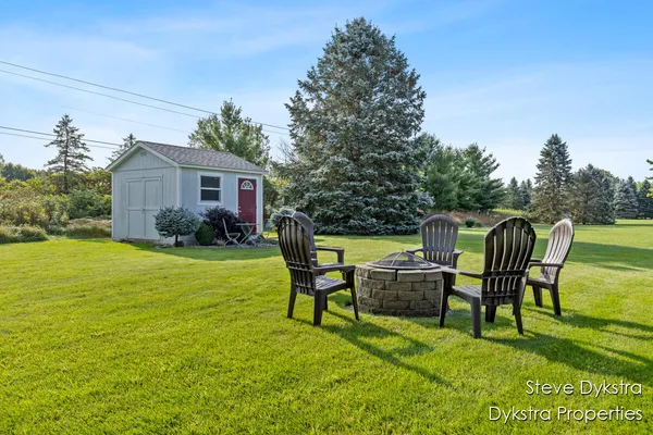 $615,000 | 2264 Grand Valley Drive Northeast, Ada, MI 49301