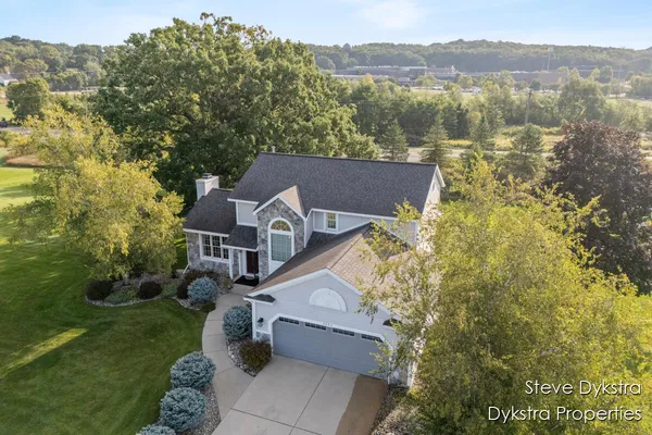 $615,000 | 2264 Grand Valley Drive Northeast, Ada, MI 49301