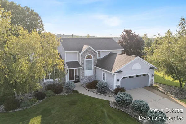 $615,000 | 2264 Grand Valley Drive Northeast, Ada, MI 49301