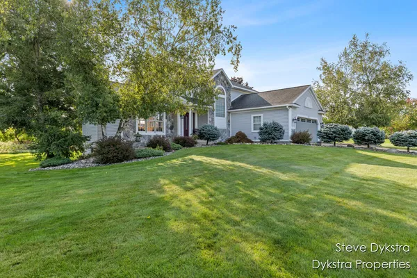 $615,000 | 2264 Grand Valley Drive Northeast, Ada, MI 49301