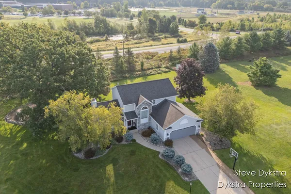 $615,000 | 2264 Grand Valley Drive Northeast, Ada, MI 49301