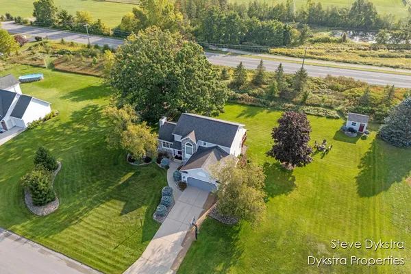 $615,000 | 2264 Grand Valley Drive Northeast, Ada, MI 49301