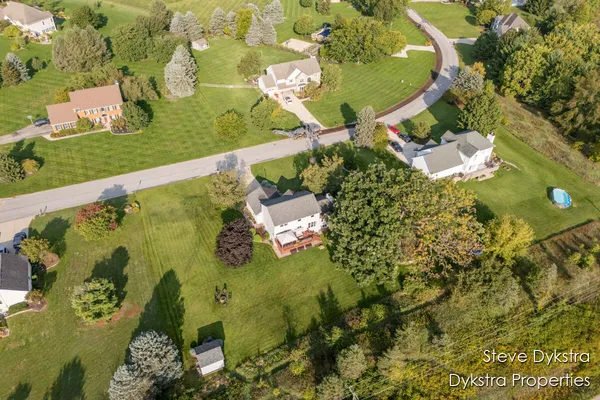 $615,000 | 2264 Grand Valley Drive Northeast, Ada, MI 49301